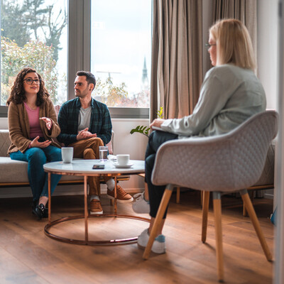 Couple talking with a therapist