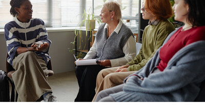 People sitting together in a support group